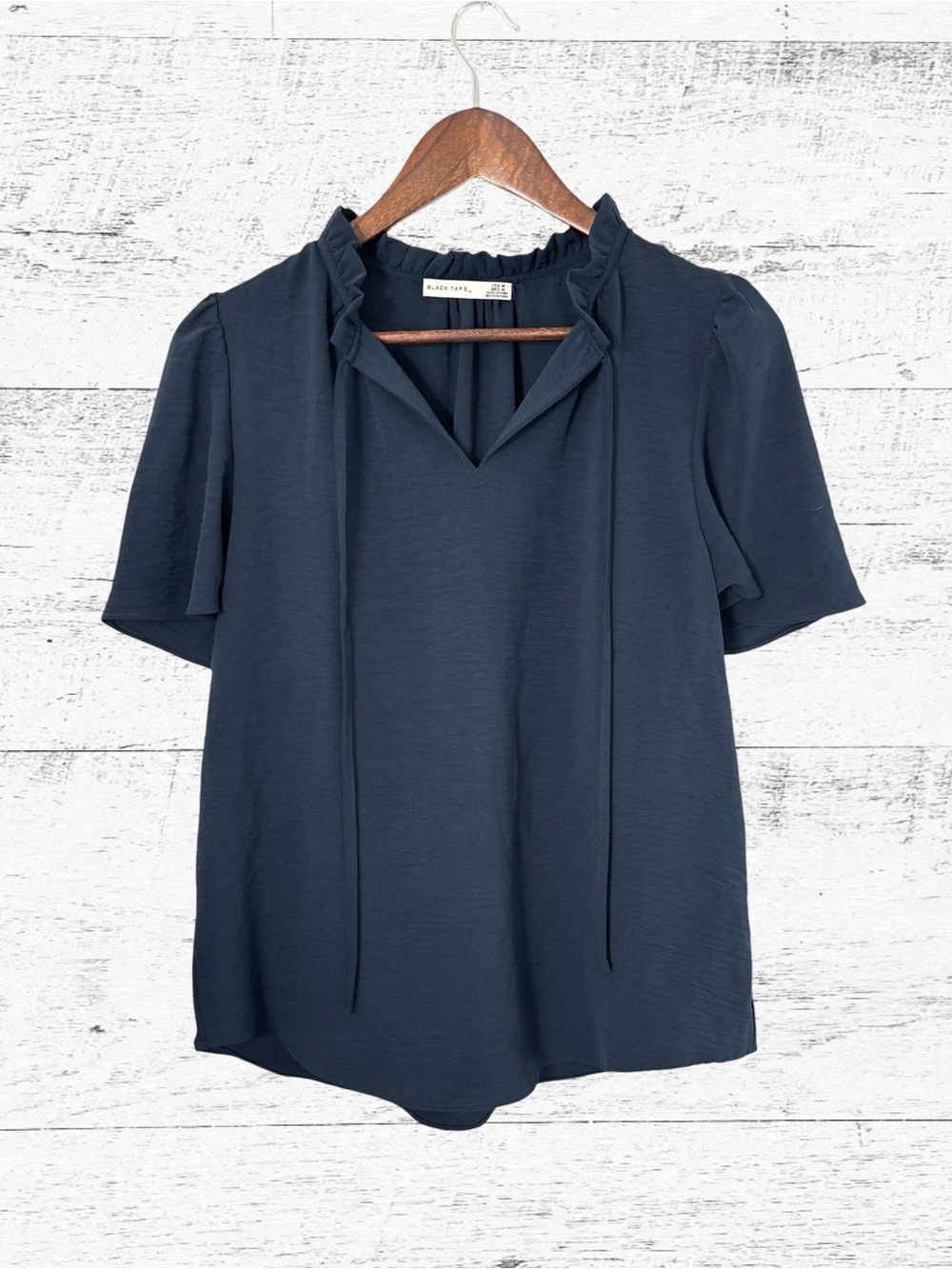 Black Tape_ Navy Ruffle Tie-Neck Blouse with Short Sleeves